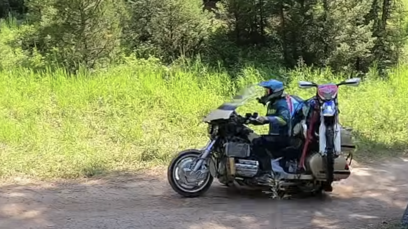 Honda Gold Wing carrying enduro bike